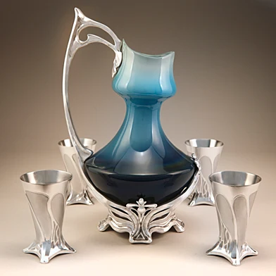 Art nouveau pitcher with cups