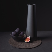 Black Tableware and Figs on Placemat