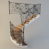Staircase with forged handrail