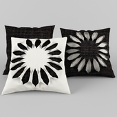 a set of black and white pillows