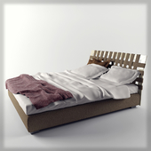 Кровать с плетением на спинке