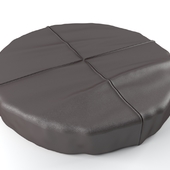 Leather pouf.