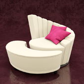 Armchair with pouf