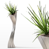 Floor vase with a plant
