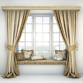 Soft quilted sill with cushions and curtains