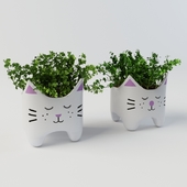 Plant with cat vases