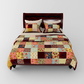 Bed with a patchwork