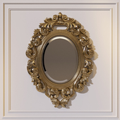 Oval carved mirror