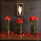 Roses in vases on a classical chest of drawers + decor Palecek