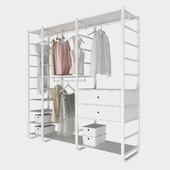 Open storage system of IKEA Elwarly with clothes