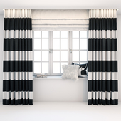 Straight black and white striped curtains in the floor with a Roman curtain, window, books and pillows on the windowsill.