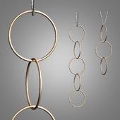 This Vertical Pendant Light Is Made Using Brass Rings