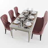 Dining table with with chairs, banquet and dishes