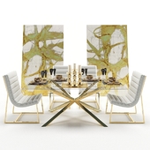 Dining table glass with armchairs and decor
