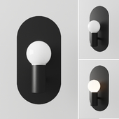 Plate matte black wall sconce by Mermelada Estudio