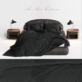 Кровать с вязанным одеялом