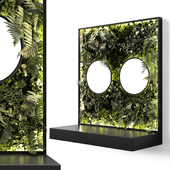 Console with mirrors and vertical garden