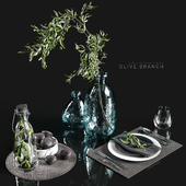 Table settings with olive branch