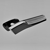The chrome door handle in a sleek design