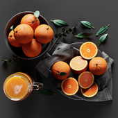 Table Setting with Oranges and Juice