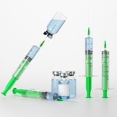 Medical kit: Syringe with needle and ampoule with vaccine