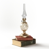 Decorative set with lamp and books.