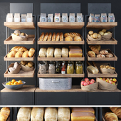 A large showcase in a bakery with bread and other products. Bakery products