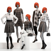 Female mannequins with clothes