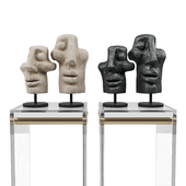 Abstract faces sculpture