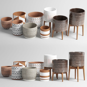 collection of earthenware and patternd concrete vases