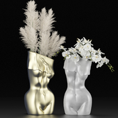 Vases in the form of a female body with bouquets of pampas grass and orchids