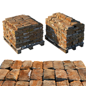 Pallets with old bricks
