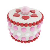 Round mini cake with multicolored candies