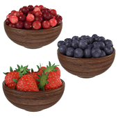 Berries in wooden bowls