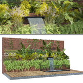 Garden green wall with small pool