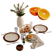 Table setting with oranges