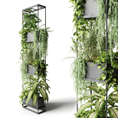 Narrow metal rack with indoor plants
