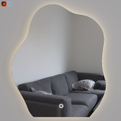 Asymmetric, wavy illuminated mirror