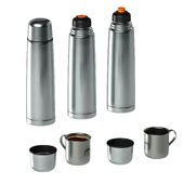 Metal thermos and mug with tea or coffee picnic set