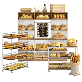 Large display case with pastries in a bakery. Bread, baguette