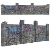 Stone fence with graffiti
