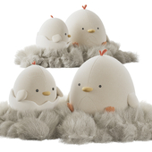 Cute plush chickens in a nest