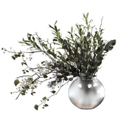 Bouquet of branches with foliage, sprigs of eucalyptus, olive and flowers