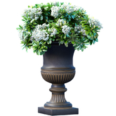 Bouquet of white flowers in a classic black vase for decoration