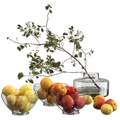 Lemons, oranges and apples in vases