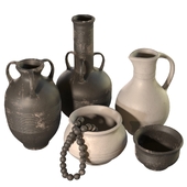 Artisan clay vessels set with ribbed pattern