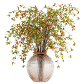bouquet of bulbous fruit branches inserted into a glass vase 02