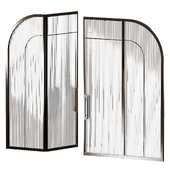 Arched door made of metal and glass. 2 types of glass - ribbed and standard.