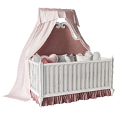 Baby crib with pillows and canopy